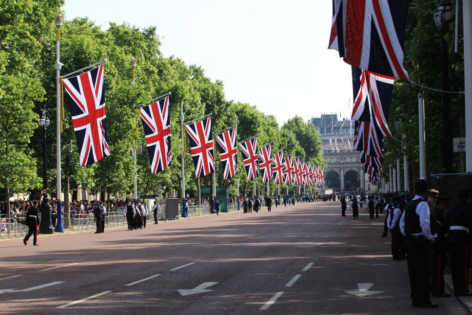 Buckingham Palace road lined with union jack flags